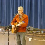 Author John Farrell sings to WBH
