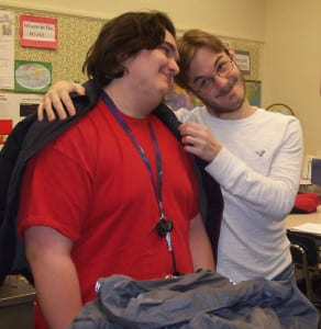 Members of the Service Club collecting coats
