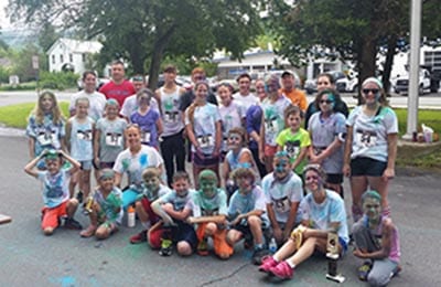 Group photo of runners in the Color Run 5K