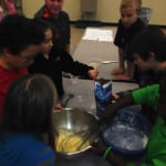 WBH students mix ingredients for cookies
