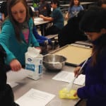 WBH students mix ingredients for cookies